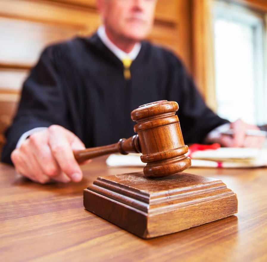 Judge's gavel on bench